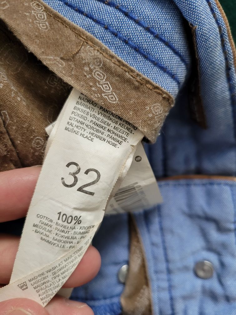 Brązowe męskie spodnie jeansowe szerokie nogawki niski stan Cropp M