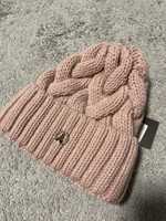 Тепла вязана шапка рожевого кольору