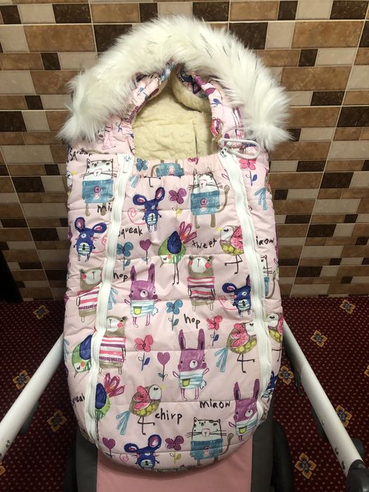 Продам зимний конверт на овчине