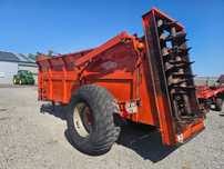 Rozrzutnik Obornika Orange 12 Ton, łańcuchy hakowe, klapa, bez korozji