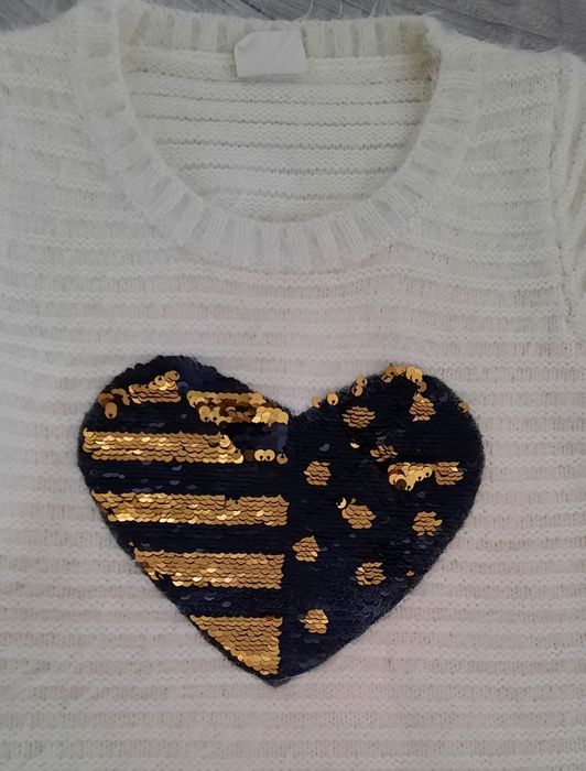 Kremowy sweterek dla dziewczynki rozm. 140