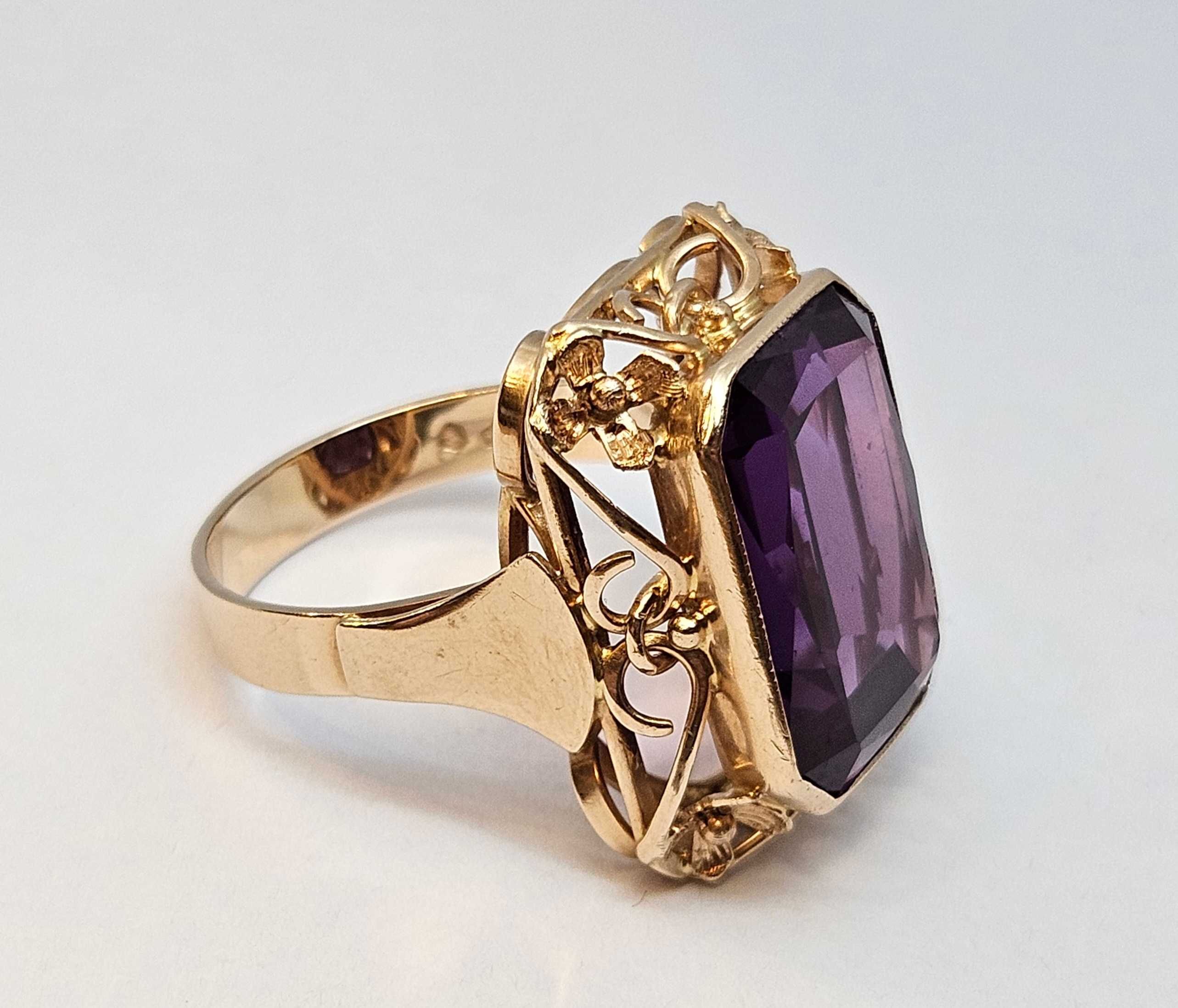 Złoty pierścionek z oczkiem 10,41g p585 roz.21 / fioletowy kamień