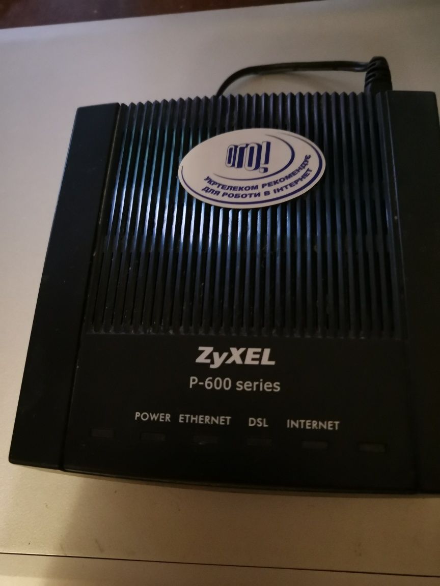 Модем Zuxel P-600 та Arris TG715X