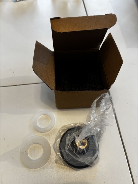 Czarny korek do umywalki klik