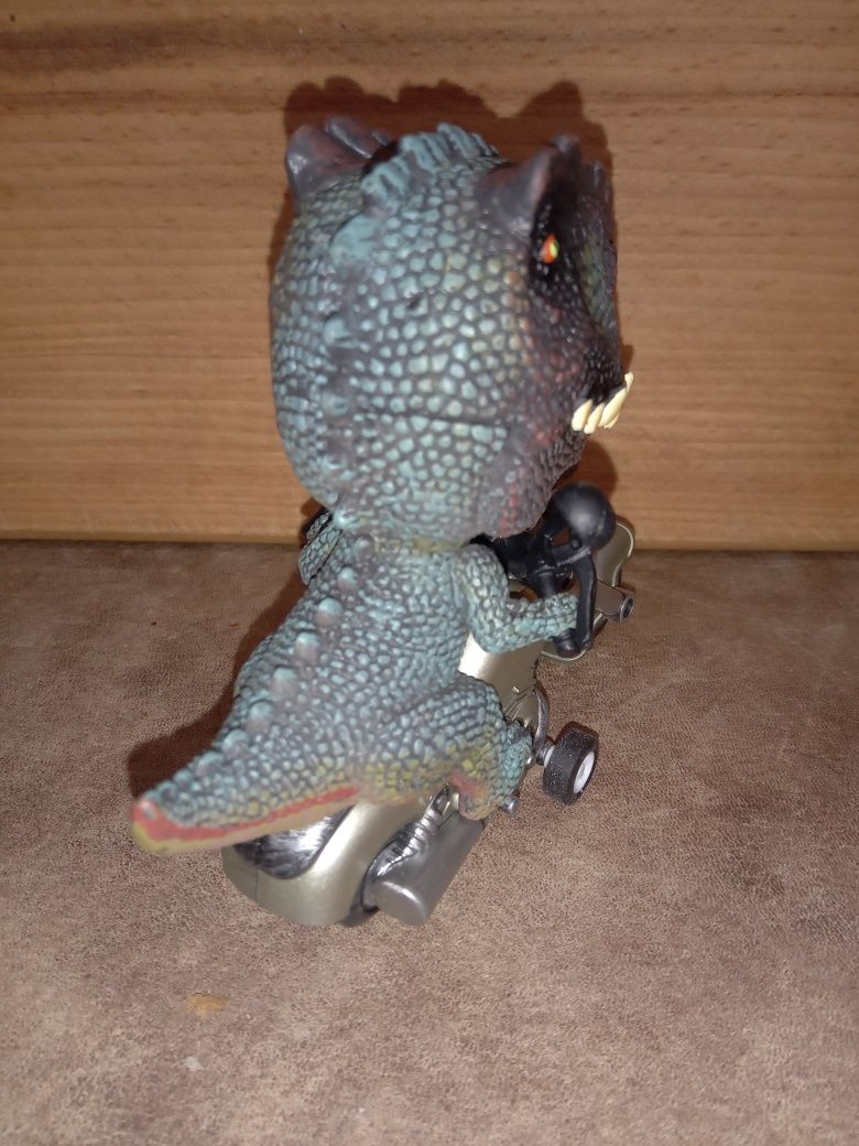 Динозавр Тиранозавр Рекс на мотоциклі