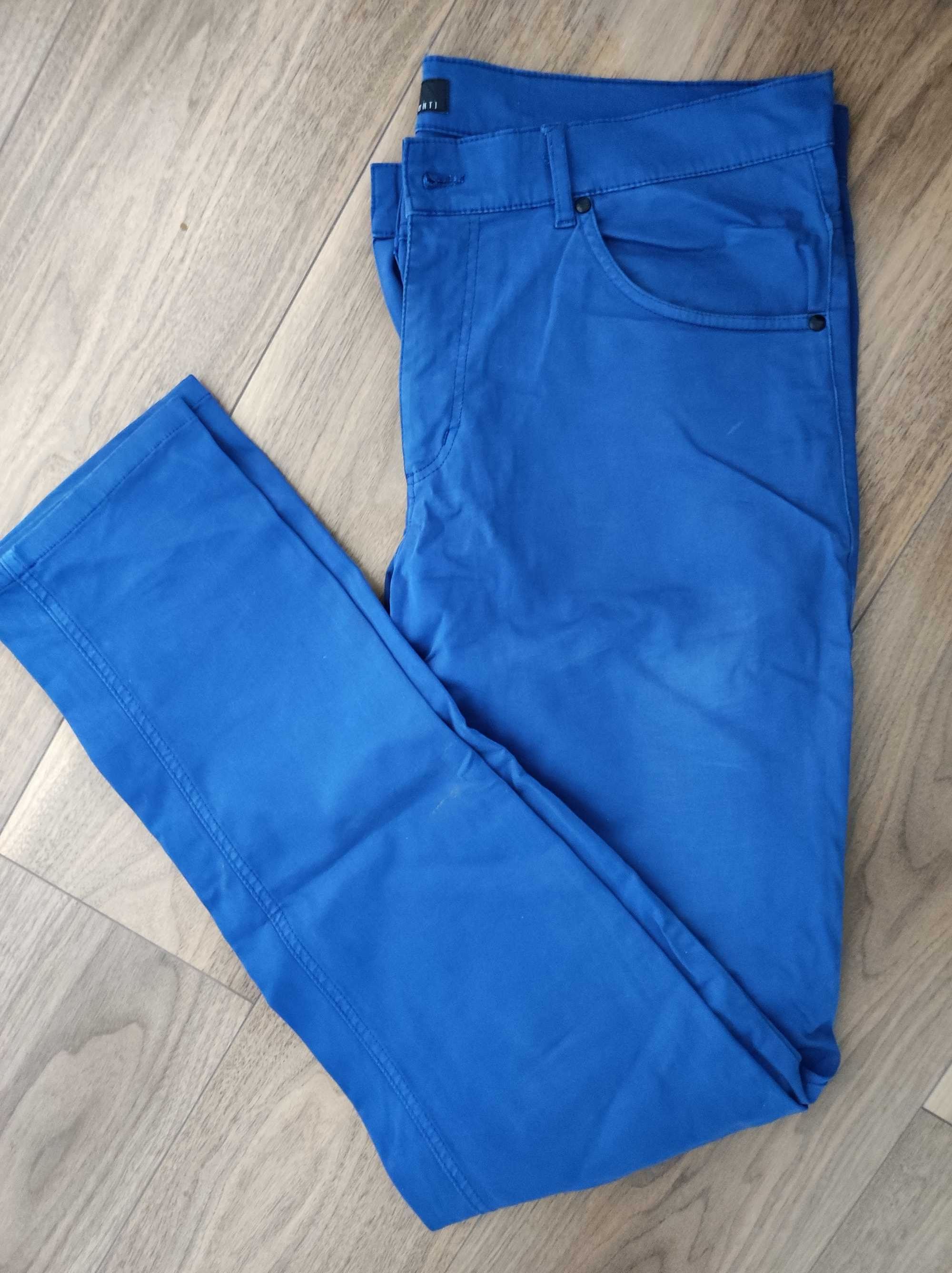 Spodnie materiałowe Giacomo Conti niebieskie