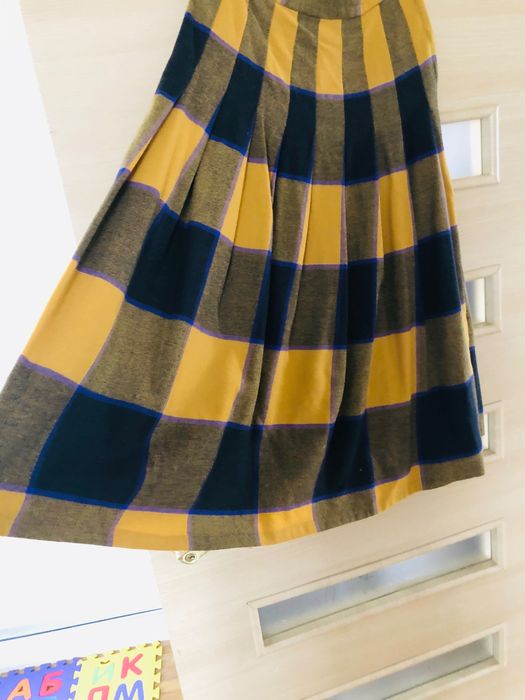 Спідниця міді в клітинку