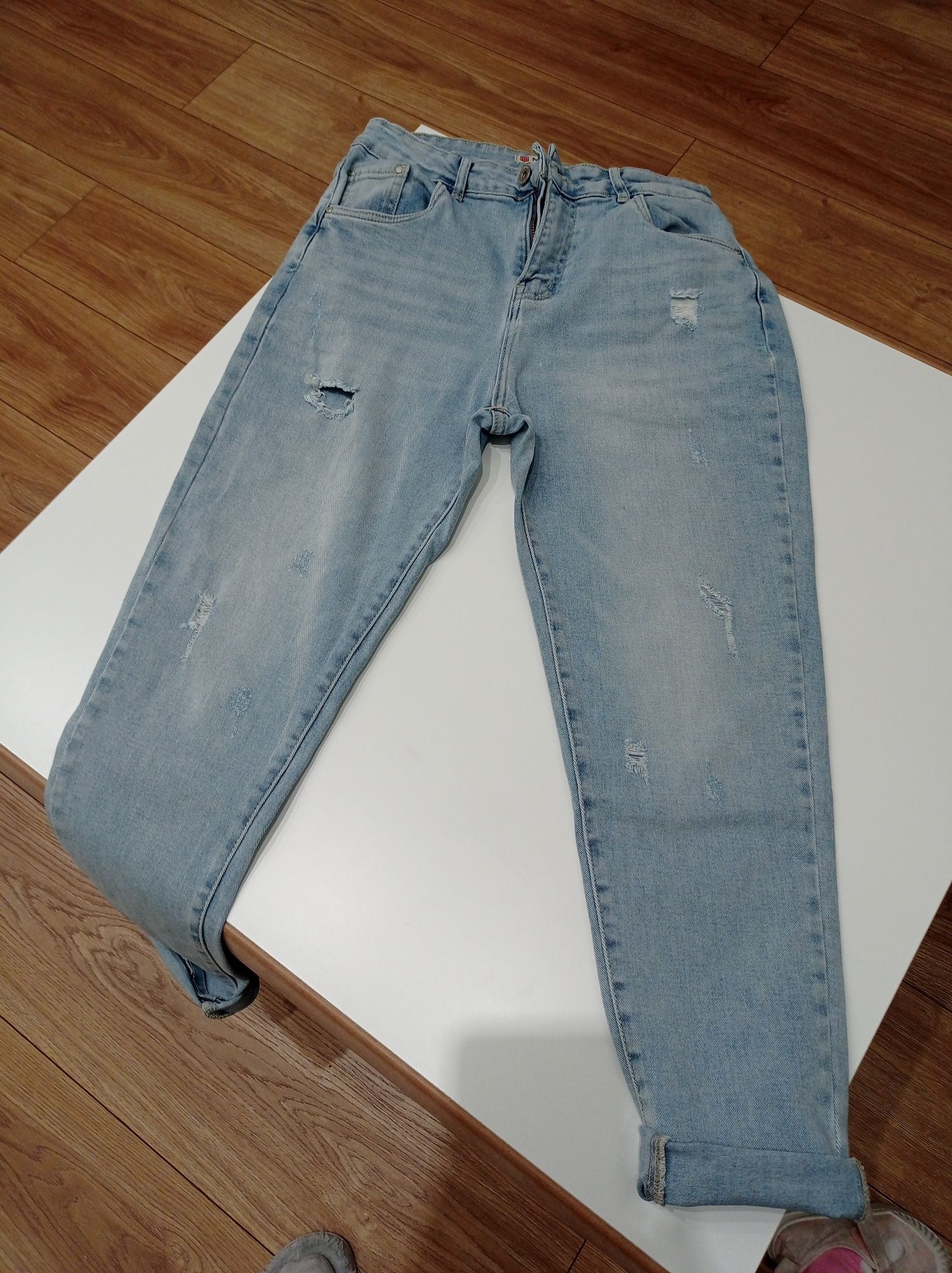 Spodnie jeansowe damskie M