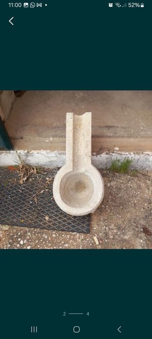 Pia de pedra redonda