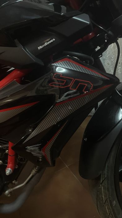 Benelli bn 125, ler descricao