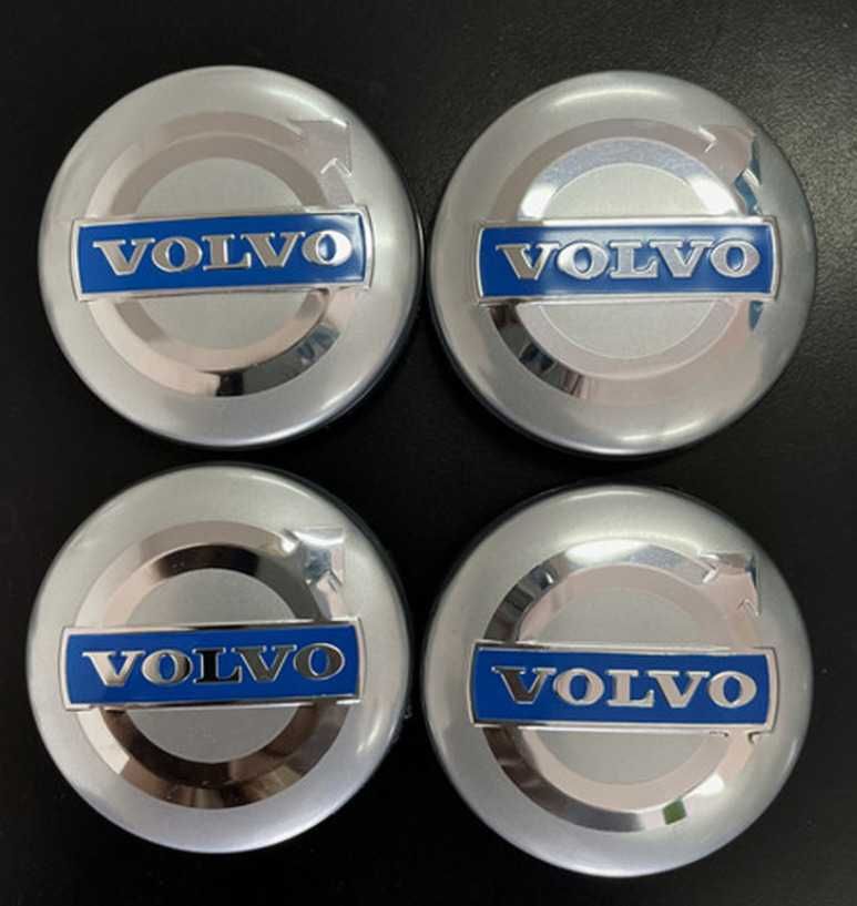 NOWE dekielki dekle logo Volvo 64mm srebrno niebieski