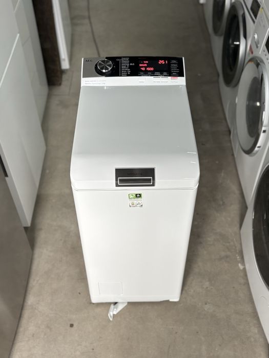AEG L8TE84565 — пральна машина з верхнім завантаженням 6 кг,1500 об/хв