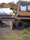 Екскаватор ківшовий Caterpillar