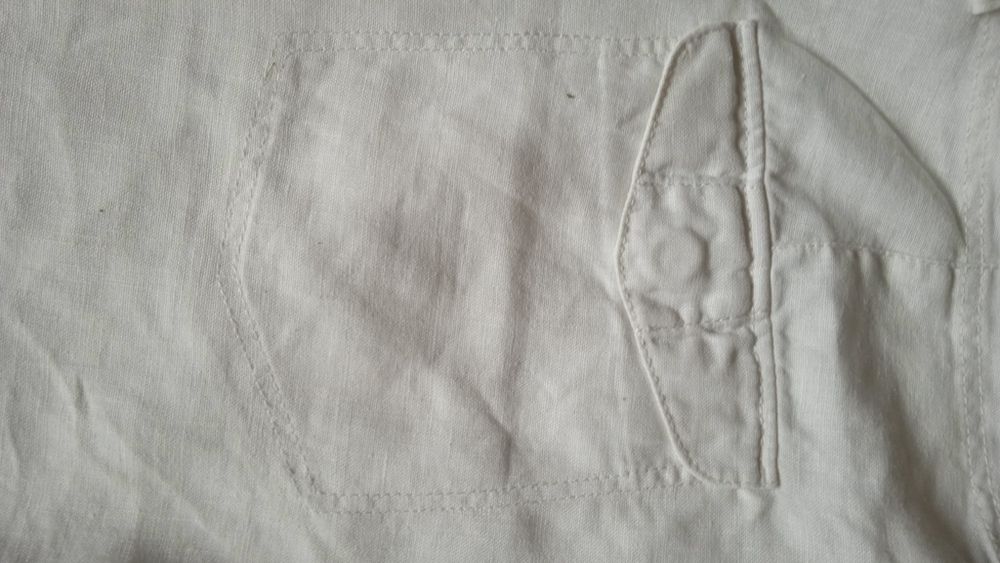 Білі широкі льняні брюки. we