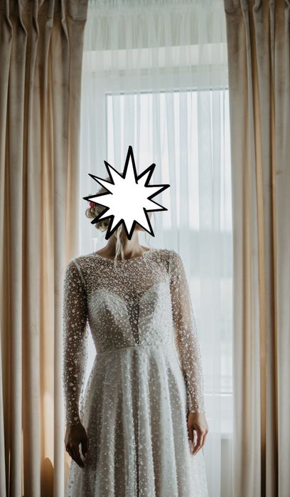 Suknia ślubna z perełkami