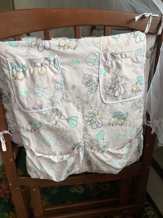 Бортики у ліжечко, балдахін, тримач для балдахіна, кишеня для дрібниць