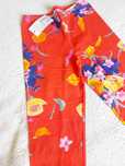 Leggins vermelhas com flores