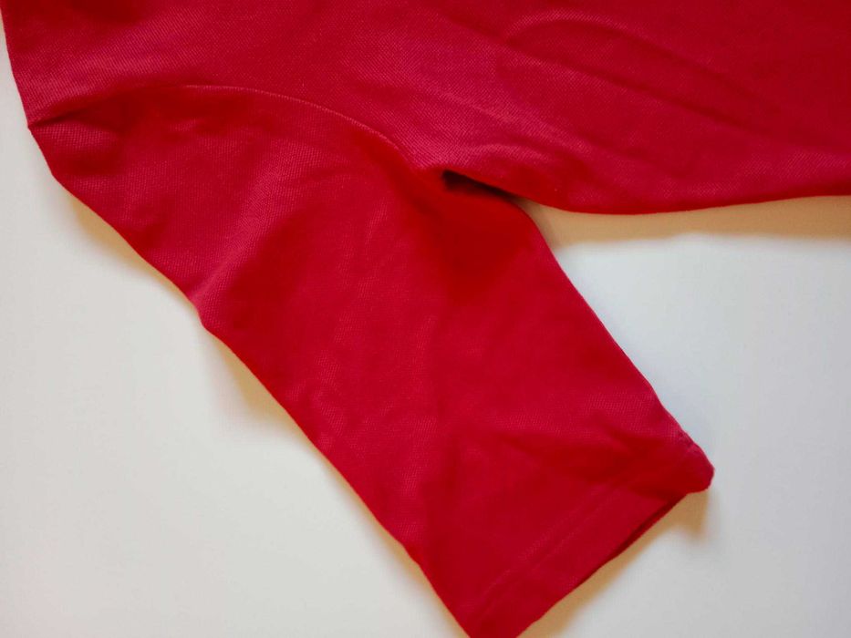 Polo Lacoste feminino tamanho 36, usado em bom estado