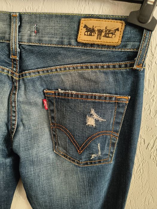 Nowe damskie jeansy Levi's 559 Marissa Bootcut W28 L32