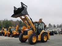 Caterpillar 444E Premier Sterowanie na Joystickach FULL OPCJA  Cały po Tulejowaniu Klima Dodatkowe Wyjścia Szybko-Złącze Przód/Tył