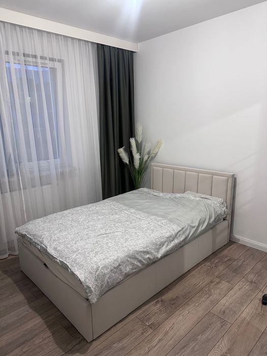 Łóżko tapicerowane z materacem 120x200 stelaż metalowy pojemnik