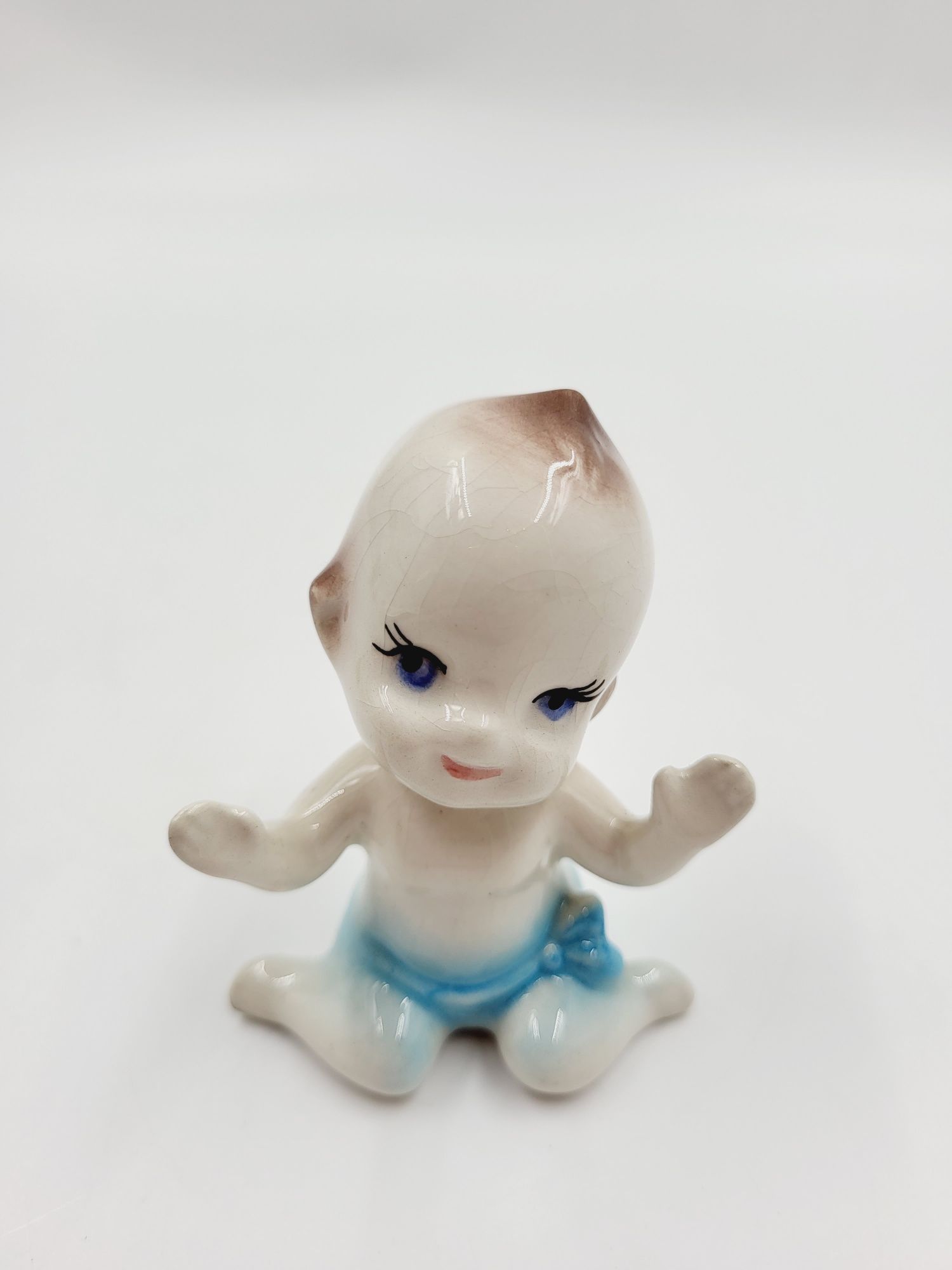 Mała ceramiczna laleczka jak Kewpie Doll