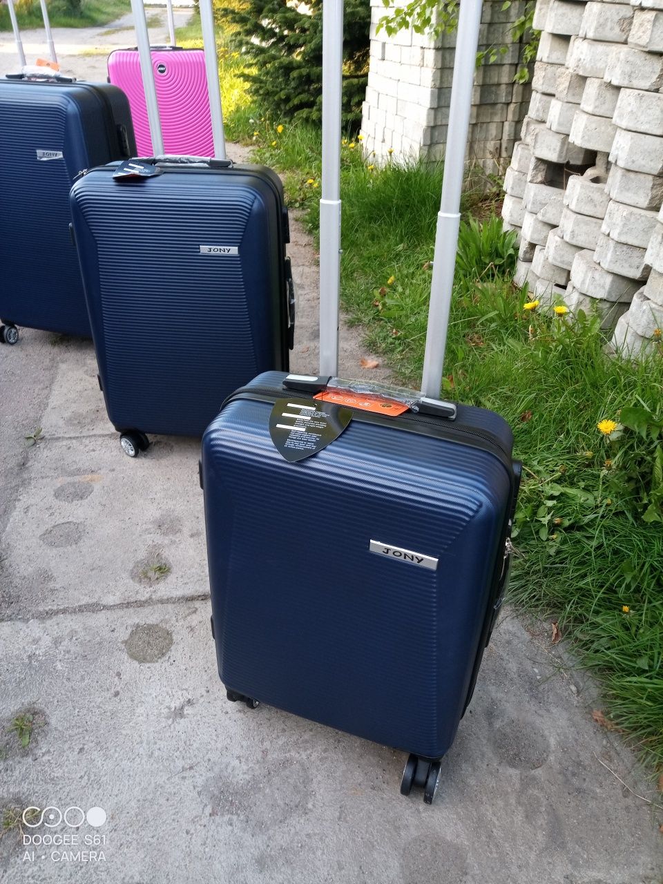 Nowa mała walizka ABS na czterech kółkach obracanych 360 stopni