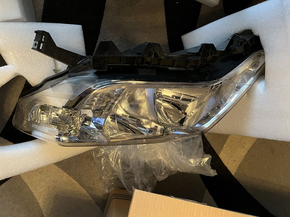 Фари Toyota Land Cruiser Prado 150 оригинал