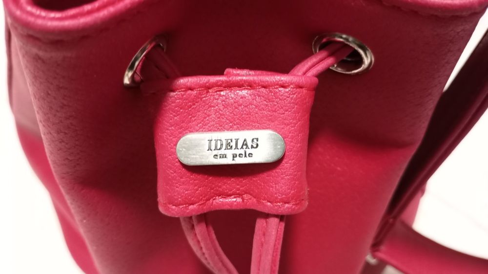 Mala vermelha em pele