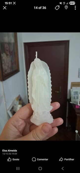 Velas em formato santos