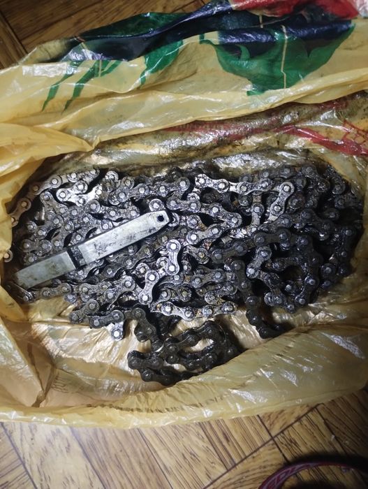 Велосипедная цепь и инструмент к ней