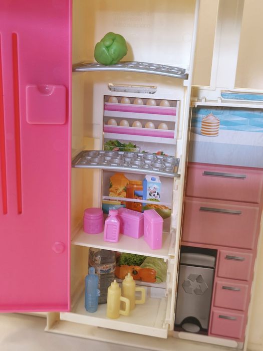 Casa da Barbie com bonecas e acessórios