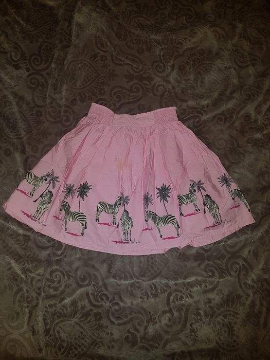 Rezerwac Różowa kloszowa spodnica dziewczęca w zebry 146-152