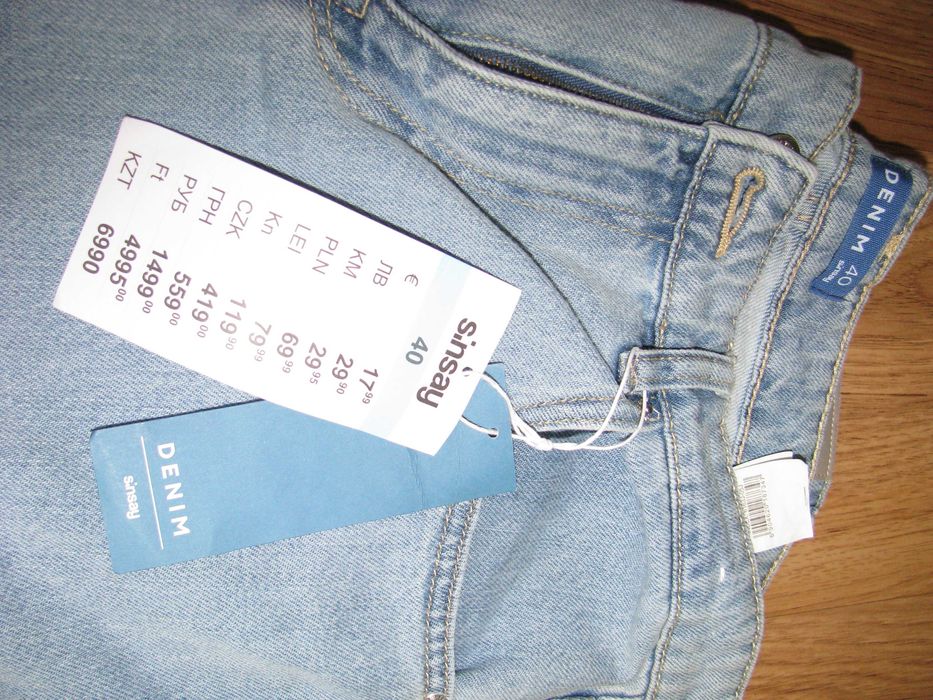 Bawełniane jeansy z prostą nogawką Sinsay/Denim