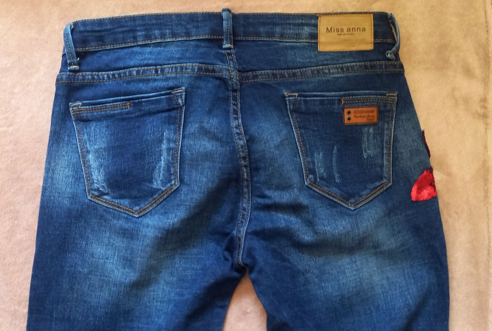 Spodnie jeans r.38/40 zdobione kwiaty