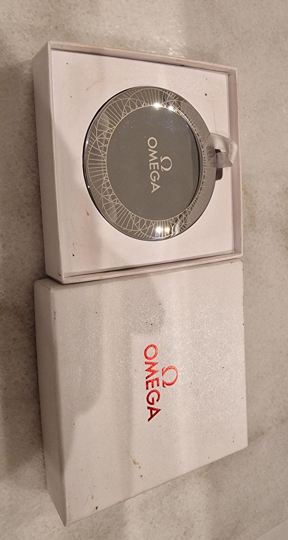 Lusterko Omega zegarki