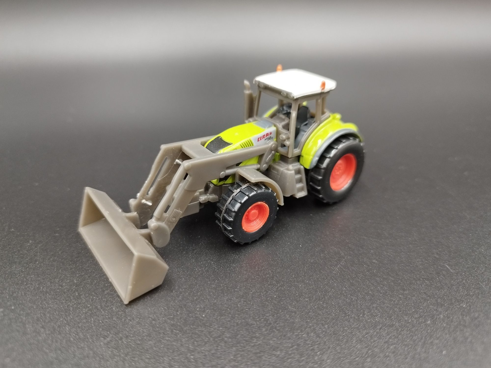 1:58 Norev Mini-jet Claas Axon 850 loader model traktor
