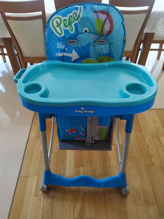 Krzesełko ze stoliczkiem do karmienia Baby design super stan