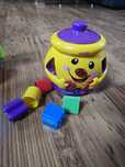 Fisher price garnuszek na klocuszek