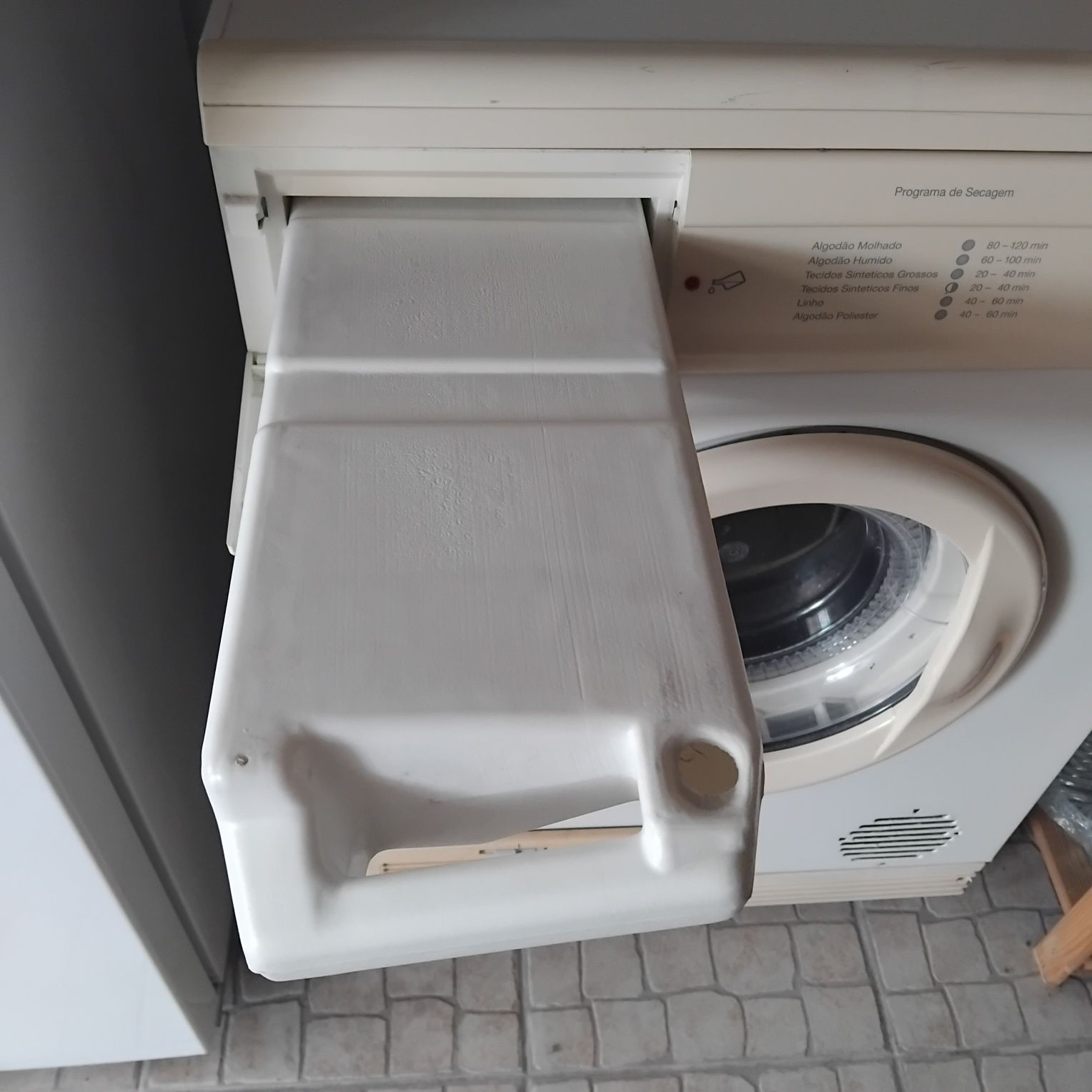 Máquina de secar roupa