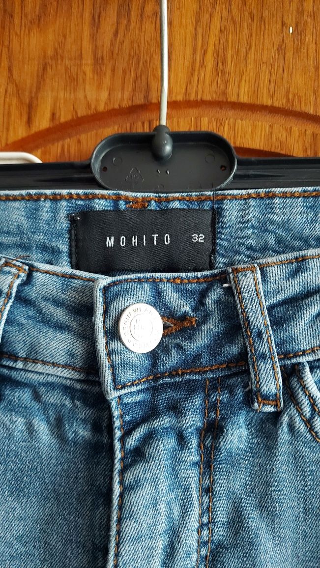 Spodnie jeansowe z dziurami Mohito 32.