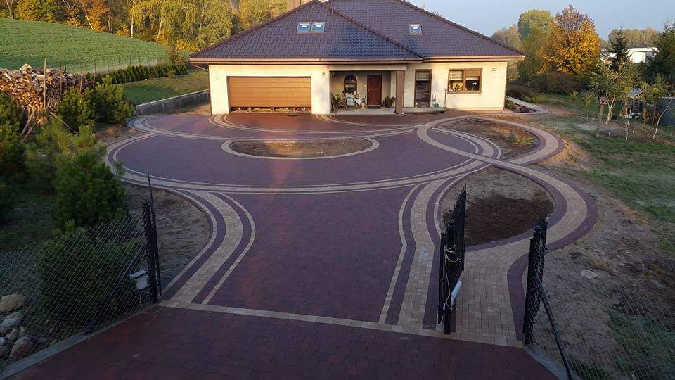 Maszynowe Układanie kostki brukowej utwardzenie terenu brukarstwo