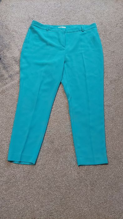 Eleganckie spodnie w kant turkus 46-48