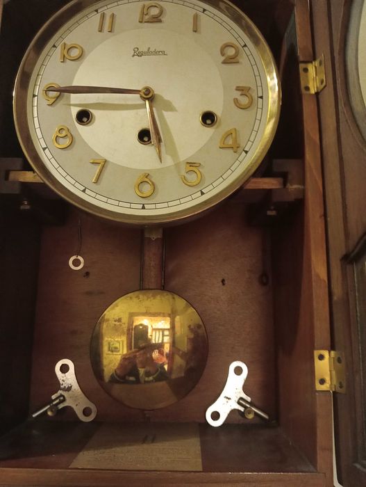 Relógio de parede de corda, Reguladora