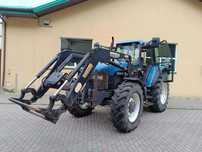 New Holland 8160  Ciągnik rolniczy New Holland 8160 z ładowaczem czołowy Stoll