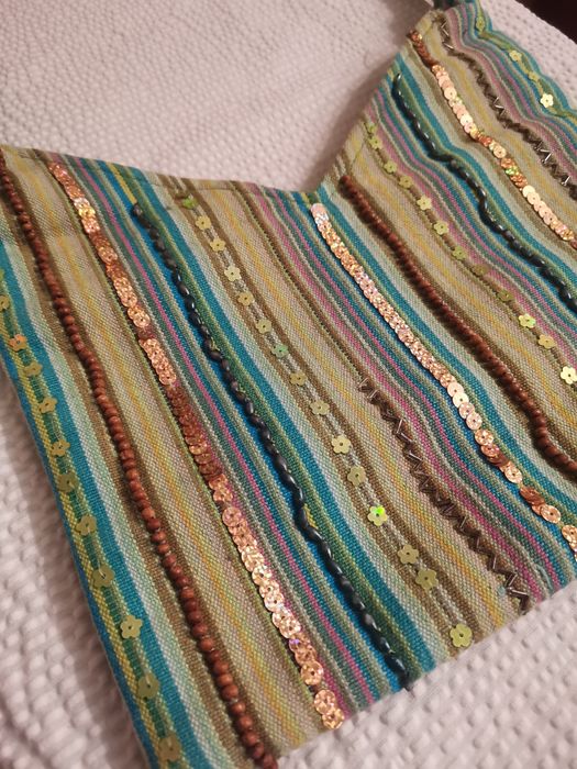 Bolsa tira colo verde de mulher