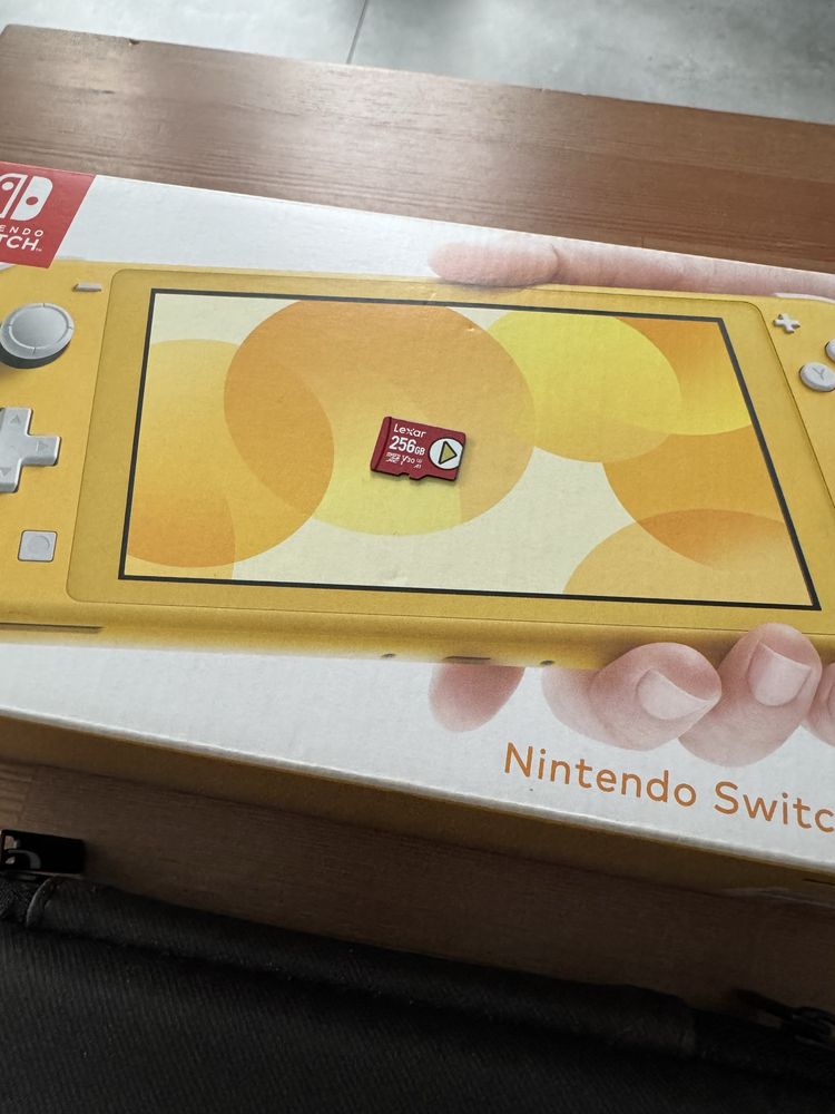 Nintendo switch lite stan idealny zestaw