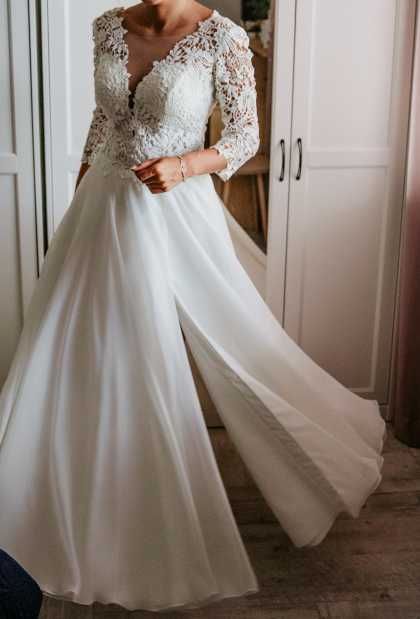 Piękna suknia ślubna z gipiurą