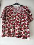 Blusa em tecido canelado com flores