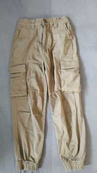 Spodnie z łańcuszkiem dla dziewczynki Reserved 140